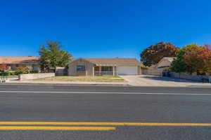 Ranch-style house featuring a garage