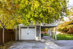 Garage with a lawn