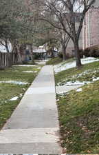 View of home's community featuring a lawn