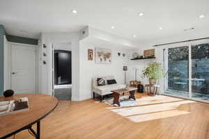 Living area featuring light wood-type flooring