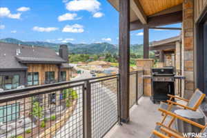 Balcony featuring a mountain view