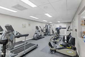 Exercise room featuring a paneled ceiling