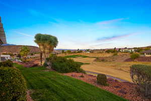 View of yard and golf course.