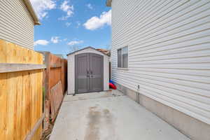 View of patio / terrace with a storage unit