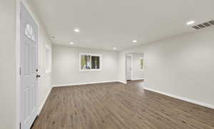 Interior space featuring dark hardwood / wood-style floors