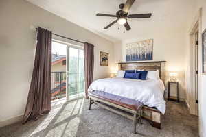 Bedroom featuring carpet floors and ceiling fan