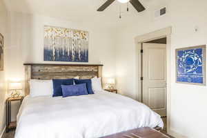 Bedroom featuring ceiling fan and carpet floors