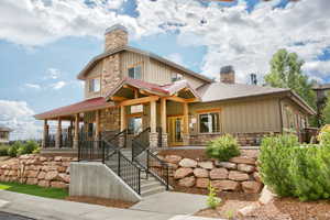 View of front of house with covered porch