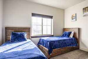 View of carpeted bedroom