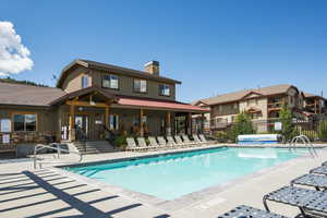 View of pool featuring a patio