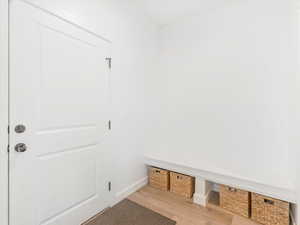 Mudroom featuring hardwood / wood-style floors