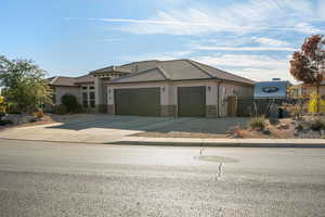 View of front facade featuring a garage