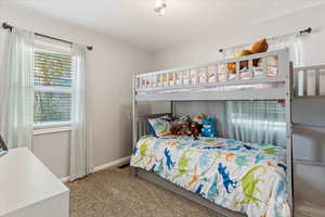 Bedroom featuring carpet floors