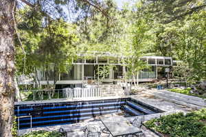 Exterior space featuring a sunroom