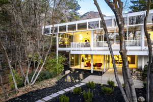 Back of house with a mountain view