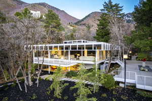 Back of property featuring a mountain view