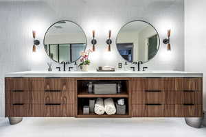 Bathroom with tile patterned flooring and tile walls