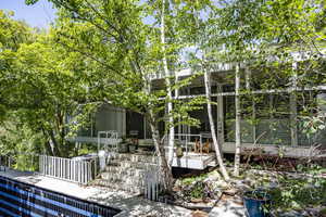 Exterior space featuring a sunroom