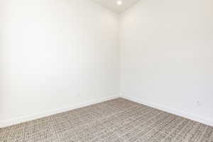 View of carpeted spare room