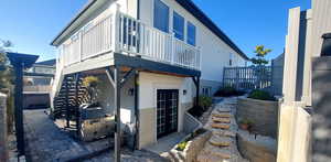 View of home's exterior featuring a deck