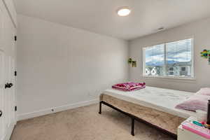 View of carpeted bedroom