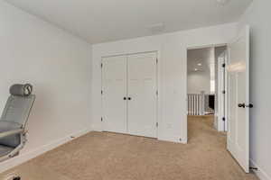 Unfurnished office with light colored carpet