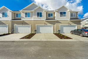 View of property featuring a garage