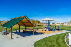 View of playground featuring a yard