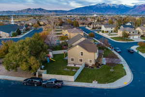 Birds eye view of property with a mountain view