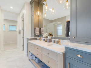 Bathroom with vanity and walk in shower