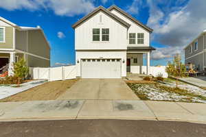 View of front of home with a garage