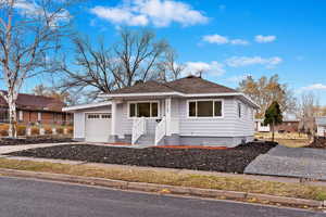 View of front of home with a garage