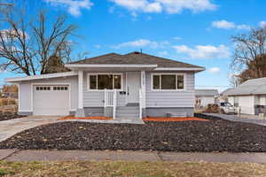 View of front of property with a garage