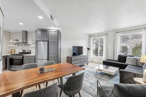 Living room featuring a textured ceiling