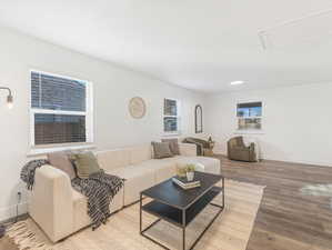 Living room with hardwood / wood-style floors