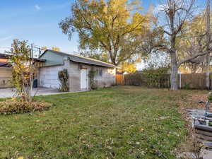 View of yard featuring shop/garage