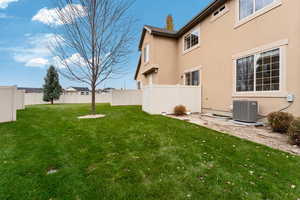 View of yard featuring central AC