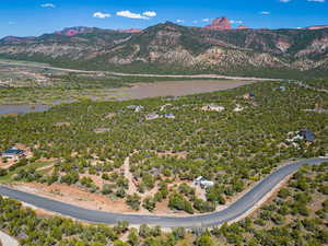 Property view of mountains featuring a water view