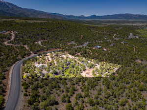 Birds eye view of property with a mountain view