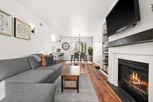 Living room featuring dark hardwood / wood-style floors