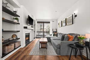 Living room featuring dark hardwood / wood-style floors