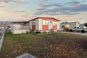 View of front of house featuring a yard