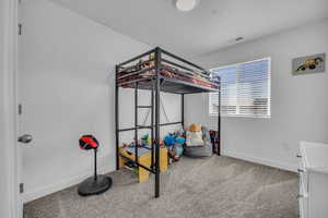 Bedroom featuring carpet