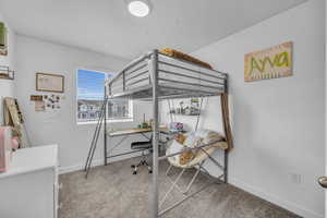 Bedroom featuring carpet floors