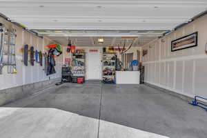 Garage featuring a garage door opener