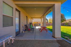 View of patio with a jacuzzi