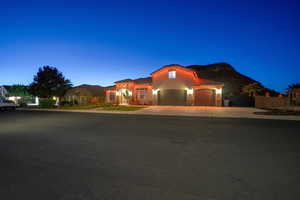 Mediterranean / spanish home featuring a garage