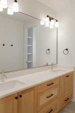 Bathroom featuring vanity and tile patterned floors