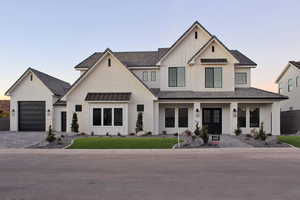 Modern farmhouse style home with a garage