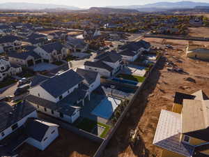 Birds eye view of property with a mountain view